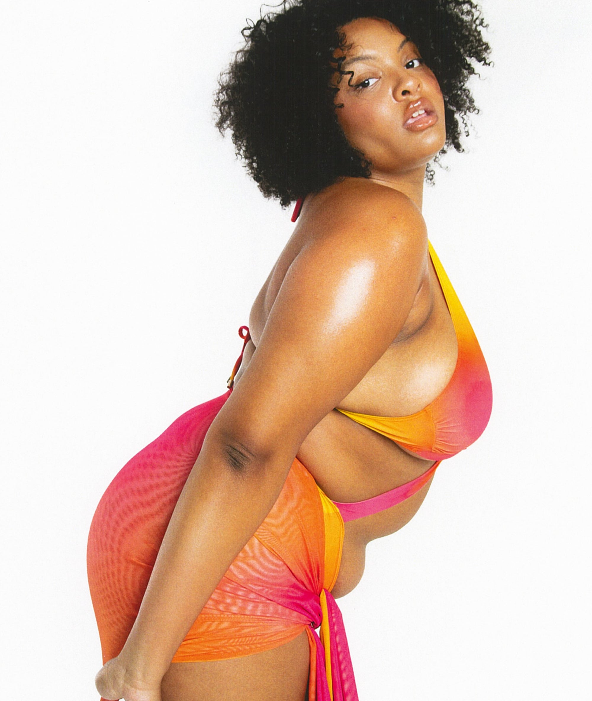 Kylie Swim Sunset Ombre Sarong on Model Size XL Paired with Caicos One-Piece, Side View